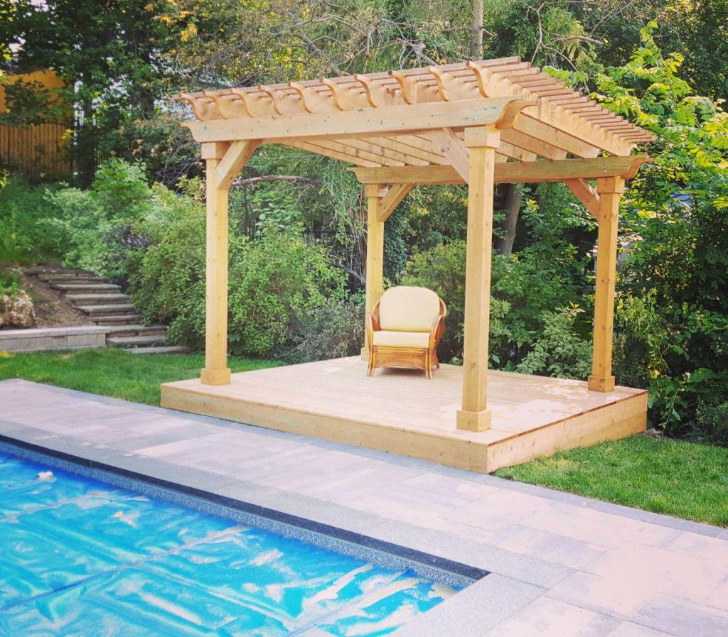 Outdoor kitchen on composite deck with sink and stovetop